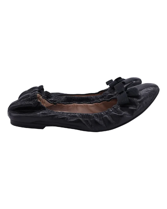 Stuart Weitzman Raven Bow Scrunch Ballet Flats in Black Leather